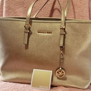 Michael Kors gold tote bag